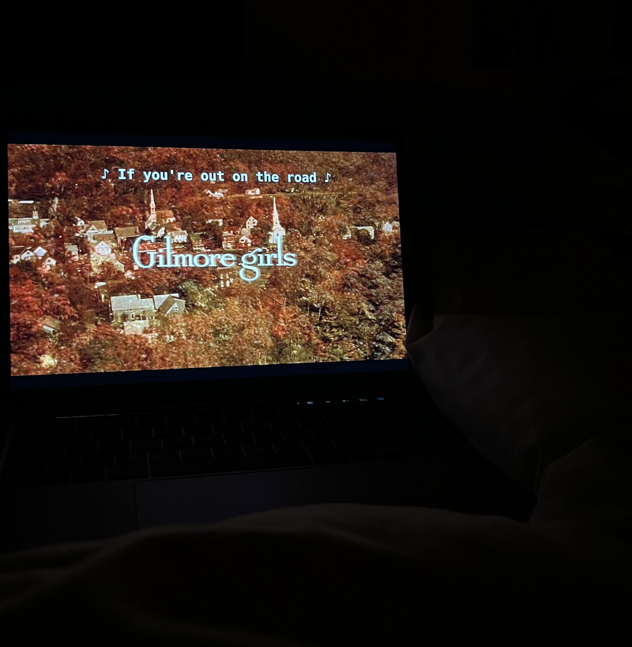 Watching Gilmore Girls in bed