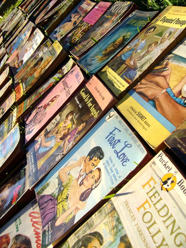 An image of the brightly coloured front covers of romance novels