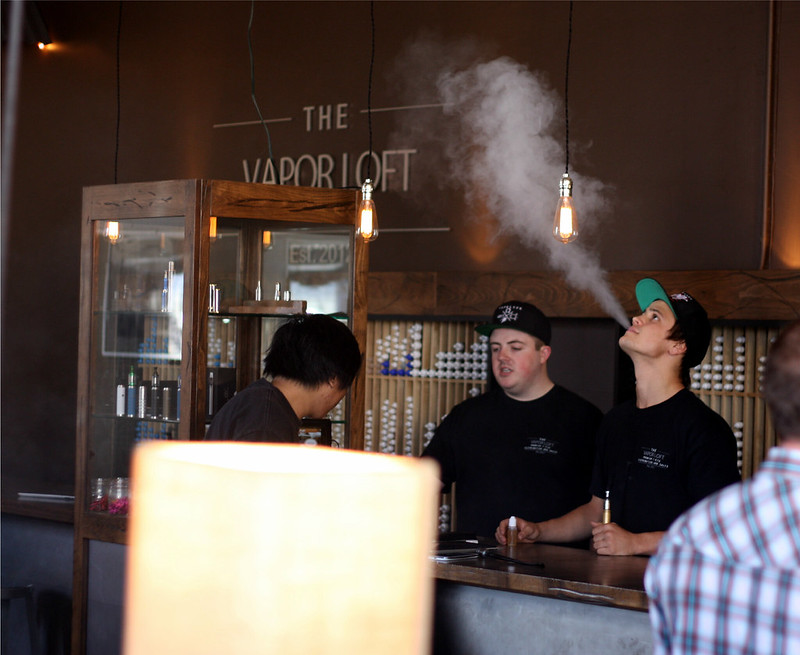 image of someone vaping inside a store
